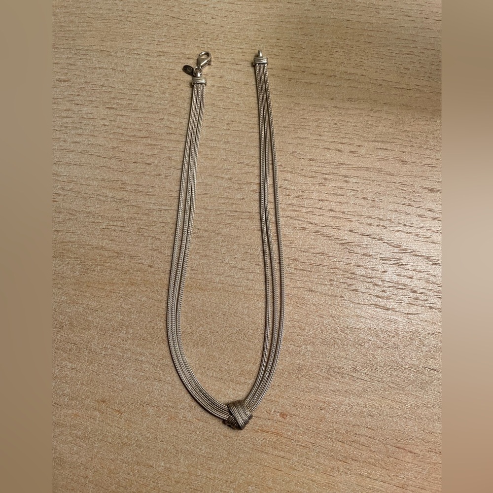 Sterling silver knot necklace.